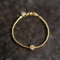 DAMES Mooi! Jewels Sieraden^Armband met beige letter | Goud